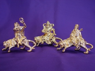 Three Deities Sitting On Tigers