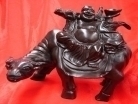 Wooden Buddha on Ox Statue