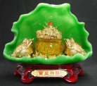 Two Golden Money Frogs on Green Lotus