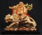 Laughing Buddha on Tiger