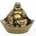 Golden Buddha Statue on Big Ingot