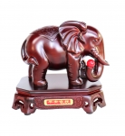 Feng Shui Elephant Holding a Red Jewel with Trunk Down